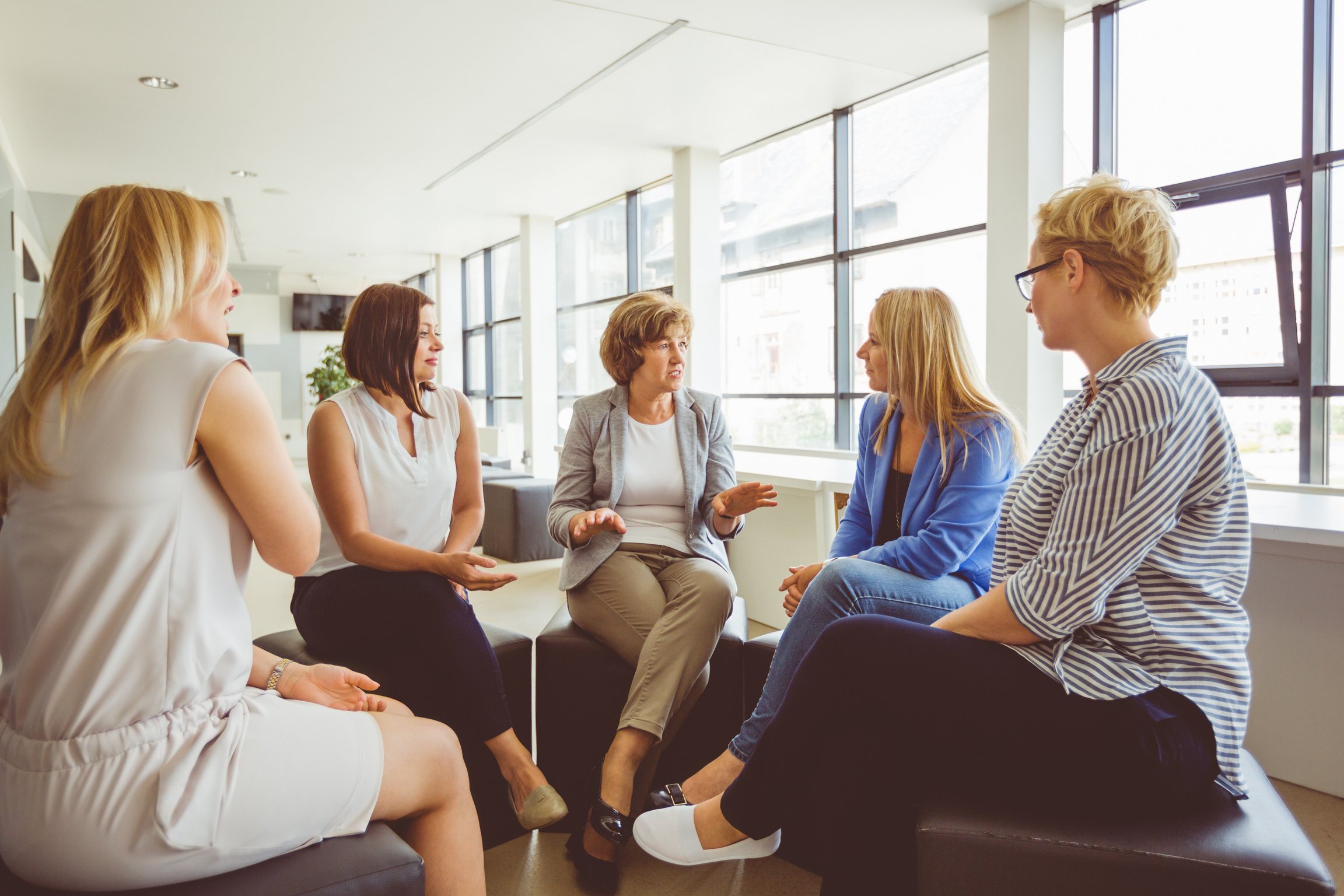 Group of women talking during training session